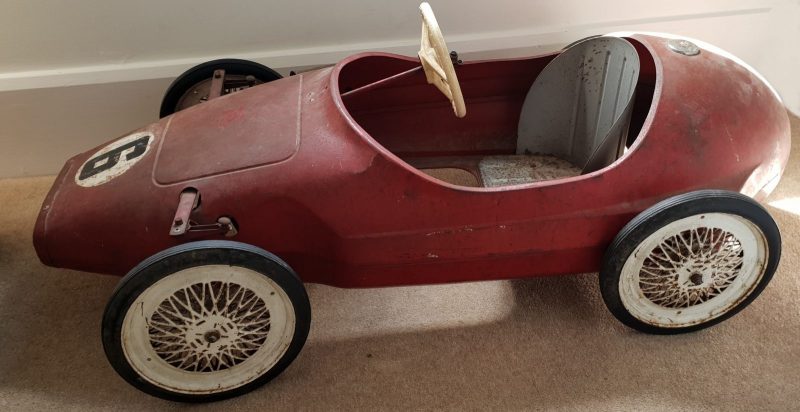 The value of vintage items often outpace many antiques such as this  mid-century pedal racing car in original unrestored condition: 