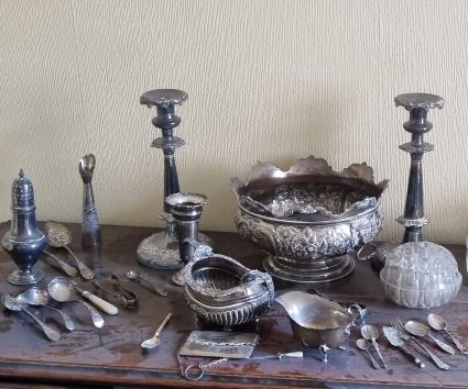 A selection of antique silver and silver plated items within an estate, awaiting an appraisal from our valuer 